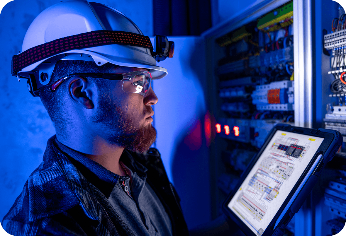 A technician working in a telecommunications facility